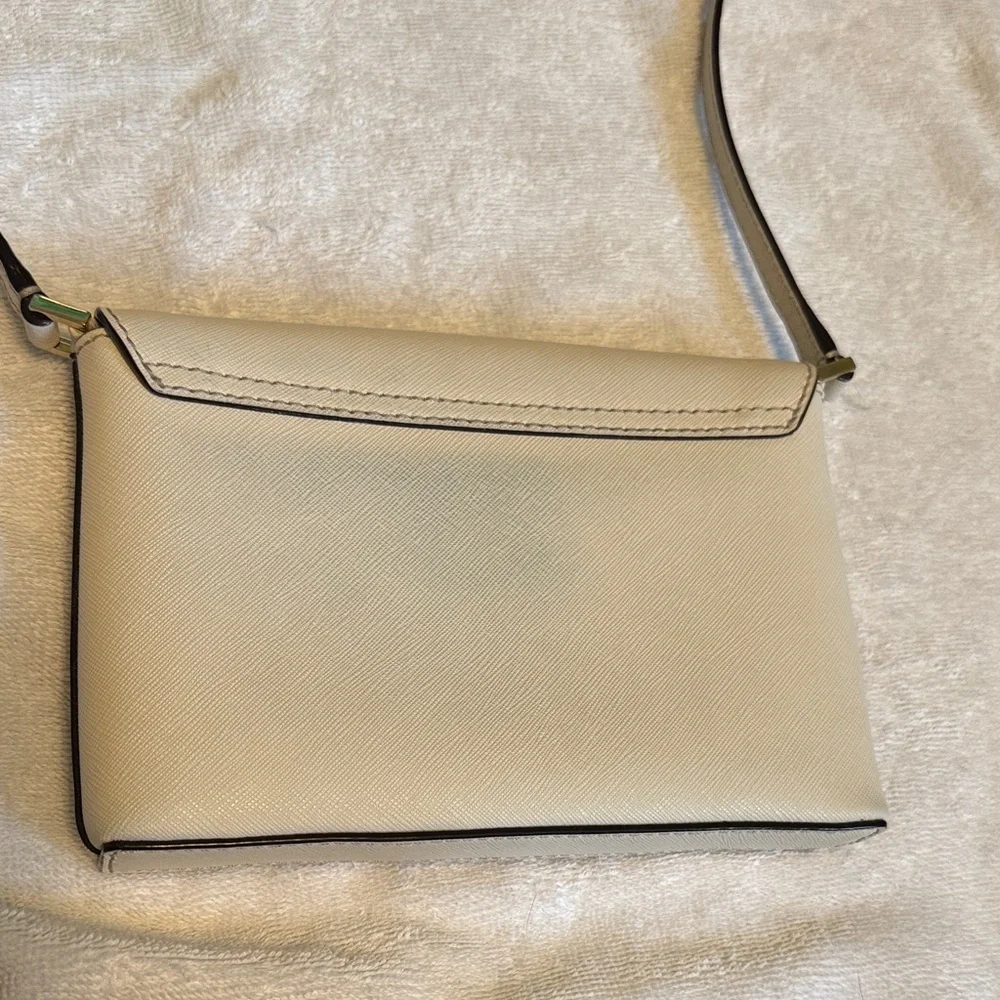 kate spade cream crossbody with gold turn-lock